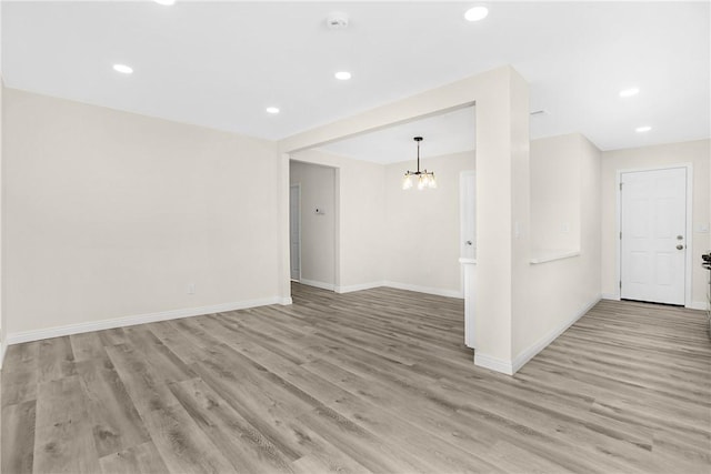 339 E 8th St, Azusa, CA 91702 - unfurnished room featuring a chandelier, light wood-style floors, and recessed lighting