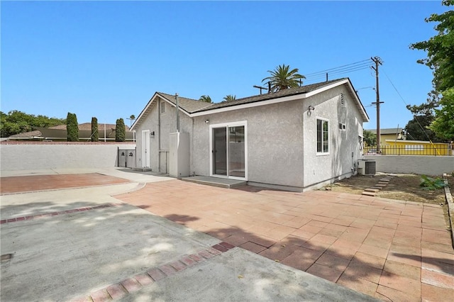 339 E 8th St, Azusa, CA 91702 - back of property featuring stucco siding and a patio