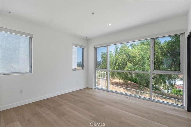 957 Figueroa Unit 318, Los Angeles, CA 90012 - empty room featuring wood finished floors and recessed lighting