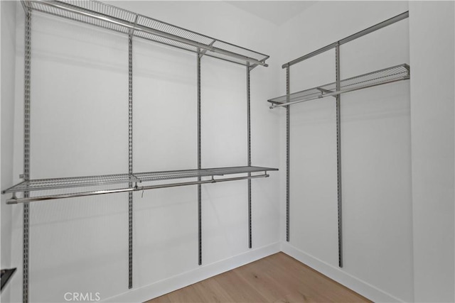 957 Figueroa Unit 318, Los Angeles, CA 90012 - spacious closet featuring wood finished floors