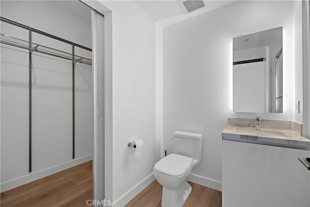 957 Figueroa Unit 318, Los Angeles, CA 90012 - bathroom with wood finished floors and vanity