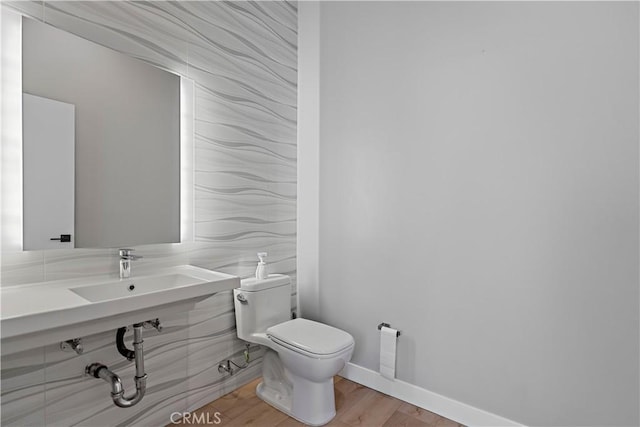 957 Figueroa Unit 318, Los Angeles, CA 90012 - bathroom featuring toilet and wood finished floors