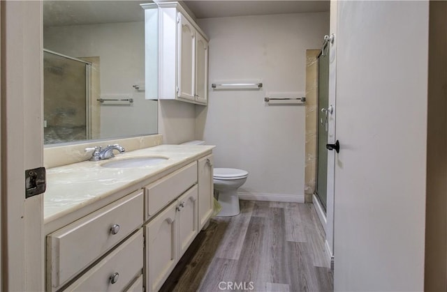 13601 Del Monte Dr Unit 51, Seal Beach, CA 90740 - full bath with vanity, a shower stall, and wood finished floors