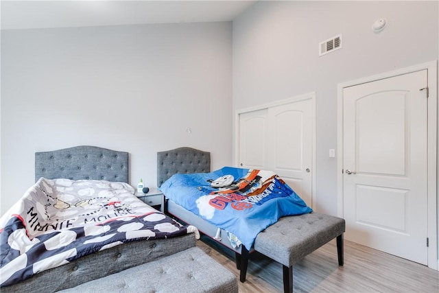 456 W Huntington Dr Unit C, Arcadia, CA 91007 - bedroom featuring wood finished floors, a closet, and high vaulted ceiling