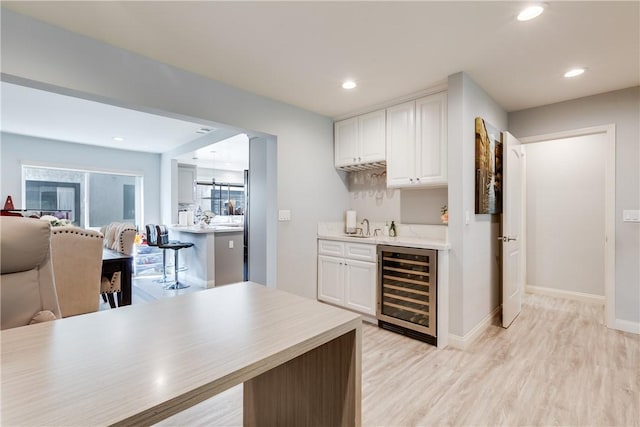 456 W Huntington Dr Unit C, Arcadia, CA 91007 - indoor wet bar featuring wine cooler, light wood-style floors, and recessed lighting