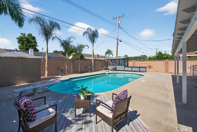 1303 E Monroe Ave, Orange, CA 92867 - view of swimming pool with a fenced backyard, a patio, and a diving board