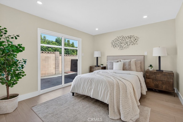 1303 E Monroe Ave, Orange, CA 92867 - bedroom with access to exterior, light wood-style floors, and recessed lighting