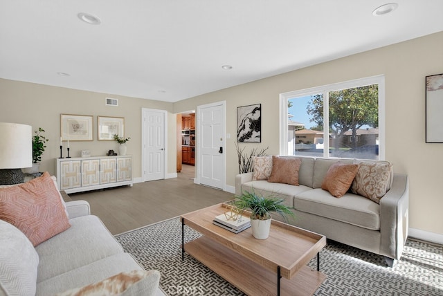 1303 E Monroe Ave, Orange, CA 92867 - living area with wood finished floors and recessed lighting