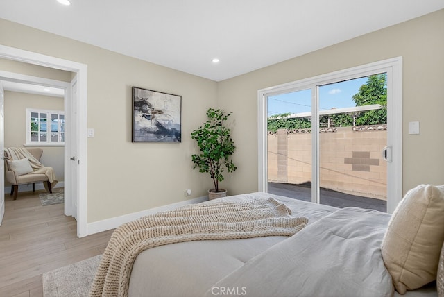 1303 E Monroe Ave, Orange, CA 92867 - bedroom featuring access to outside, recessed lighting, and light wood-type flooring