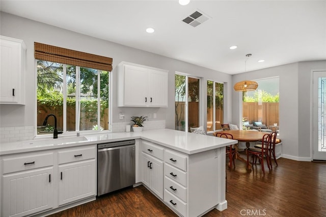 10 Cumberland Ln, Aliso Viejo, CA 92656 - kitchen with stainless steel dishwasher, a peninsula, healthy amount of natural light, light countertops, and recessed lighting