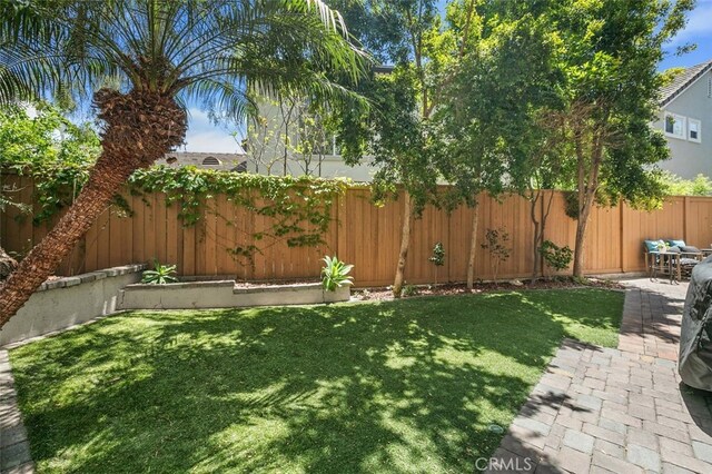 10 Cumberland Ln, Aliso Viejo, CA 92656 - fenced backyard with a patio area