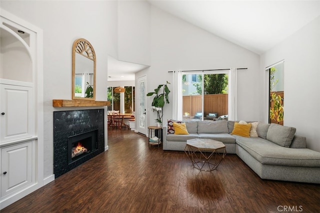 10 Cumberland Ln, Aliso Viejo, CA 92656 - living area with dark wood-style flooring, a tile fireplace, and high vaulted ceiling