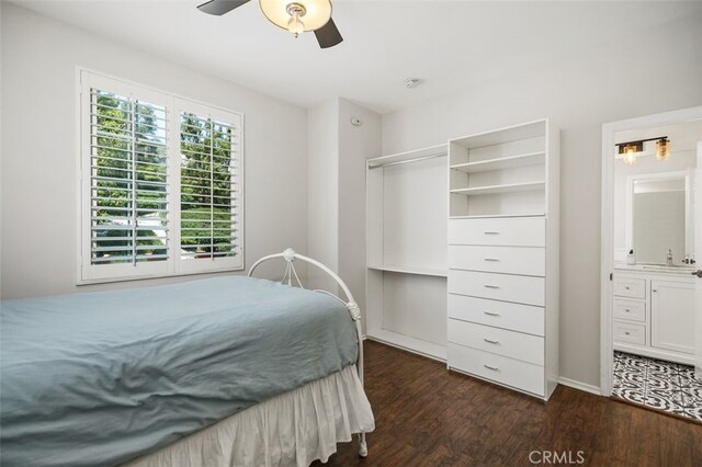 10 Cumberland Ln, Aliso Viejo, CA 92656 - bedroom with dark wood finished floors, ensuite bath, and ceiling fan
