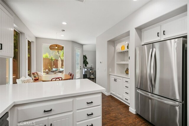 10 Cumberland Ln, Aliso Viejo, CA 92656 - kitchen with freestanding refrigerator, dark wood-type flooring, light countertops, recessed lighting, and white cabinets
