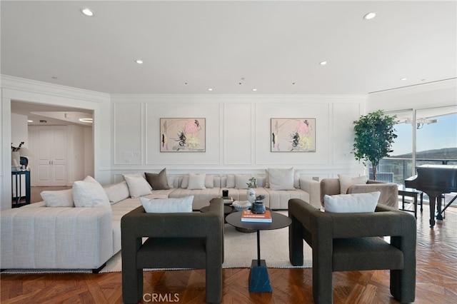 10490 Wilshire Blvd Unit 2704, Los Angeles, CA 90024 - living area with a decorative wall, crown molding, and recessed lighting