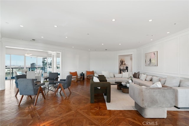 10490 Wilshire Blvd Unit 2704, Los Angeles, CA 90024 - living room featuring a decorative wall, crown molding, and recessed lighting
