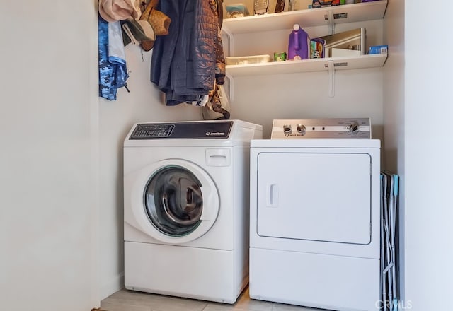 2015 E Broadway Unit 402, Long Beach, CA 90803 - laundry area with independent washer and dryer and light wood finished floors