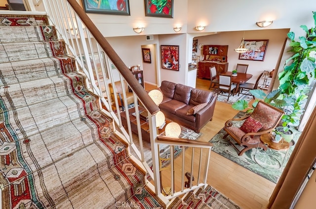 2015 E Broadway Unit 402, Long Beach, CA 90803 - living area with wood finished floors and stairway