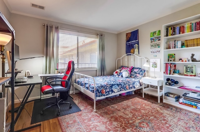 2015 E Broadway Unit 402, Long Beach, CA 90803 - bedroom with wood finished floors, a desk, and crown molding