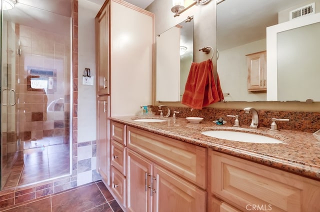 2015 E Broadway Unit 402, Long Beach, CA 90803 - full bath featuring double vanity, a stall shower, and tile patterned floors