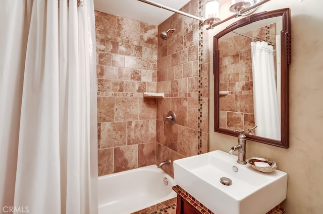 2015 E Broadway Unit 402, Long Beach, CA 90803 - bathroom featuring shower / bath combo with shower curtain and vanity