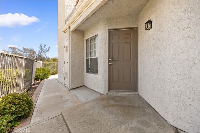 13199 Spire Cir, Chino Hills, CA 91709 - view of exterior entry with stucco siding