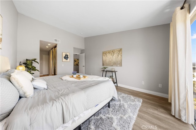 13199 Spire Cir, Chino Hills, CA 91709 - bedroom featuring light wood-style floors and baseboards