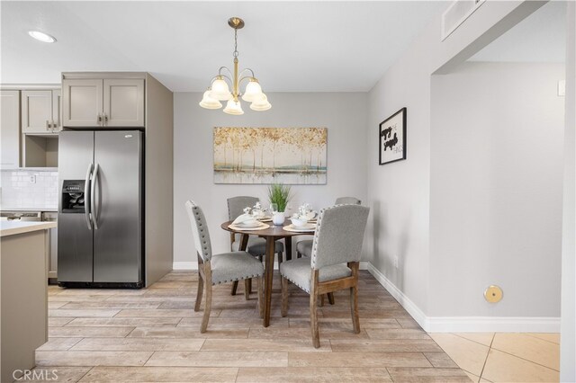 13199 Spire Cir, Chino Hills, CA 91709 - dining space with a chandelier, light wood-type flooring, and recessed lighting