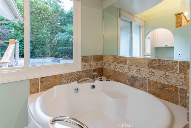 1525 Ramona Dr, Camarillo, CA 93010 - bathroom with a garden tub and healthy amount of natural light