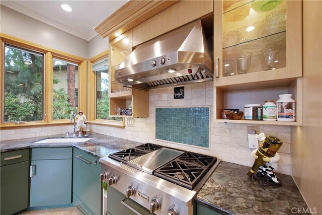 1525 Ramona Dr, Camarillo, CA 93010 - kitchen with range hood, stainless steel gas stovetop, tasteful backsplash, and dark stone countertops