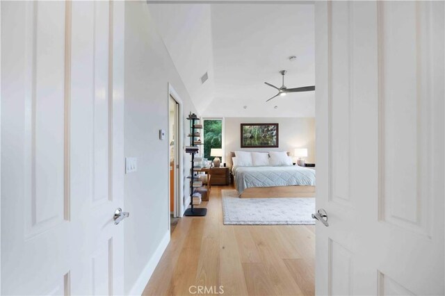 1525 Ramona Dr, Camarillo, CA 93010 - bedroom with light wood-style floors and lofted ceiling