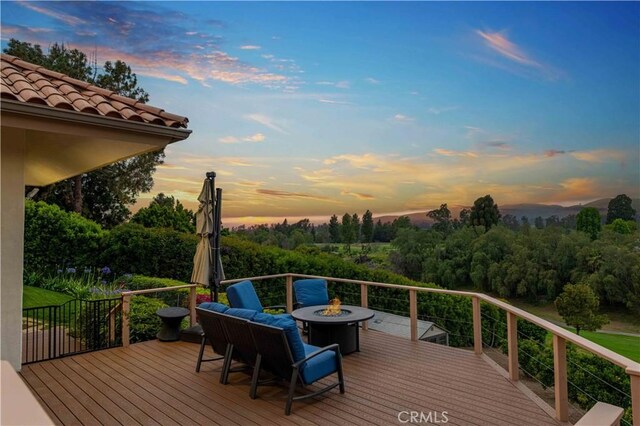 1525 Ramona Dr, Camarillo, CA 93010 - wooden deck featuring a fire pit