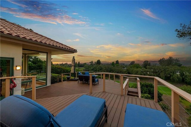 1525 Ramona Dr, Camarillo, CA 93010 - deck at dusk with outdoor dining area