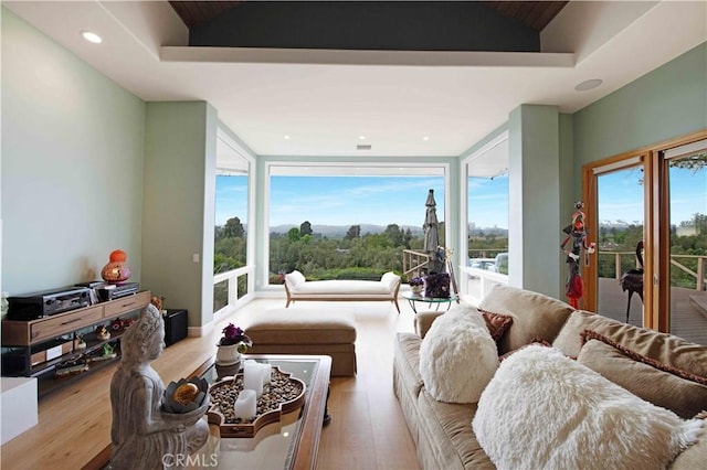 1525 Ramona Dr, Camarillo, CA 93010 - living area with wood finished floors, lofted ceiling, and recessed lighting