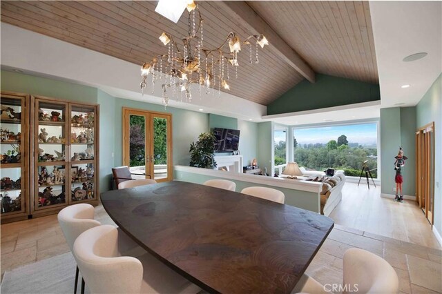 1525 Ramona Dr, Camarillo, CA 93010 - dining area with wooden ceiling, stone tile flooring, a chandelier, and french doors