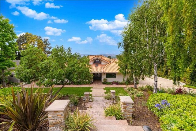 1525 Ramona Dr, Camarillo, CA 93010 - back of property featuring a tiled roof and stucco siding