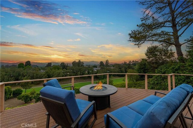 1525 Ramona Dr, Camarillo, CA 93010 - deck with an outdoor living space with a fire pit and view of scattered trees