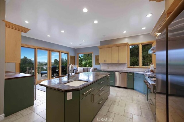 1525 Ramona Dr, Camarillo, CA 93010 - kitchen with dishwasher, stone tile floors, decorative backsplash, recessed lighting, and a center island with sink