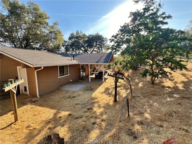44293 Copper Creek Way, Coarsegold, CA 93614 - rear view of property with a patio and roof with shingles