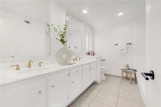 9921 Oceancrest Dr, Huntington Beach, CA 92646 - full bathroom with double vanity, tile patterned floors, and recessed lighting
