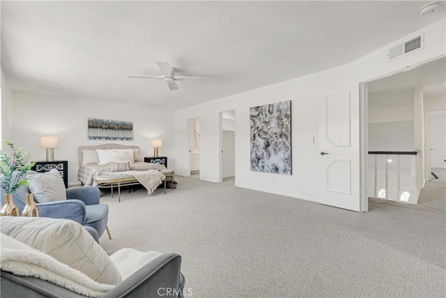 9921 Oceancrest Dr, Huntington Beach, CA 92646 - bedroom featuring carpet floors, ceiling fan, and a walk in closet