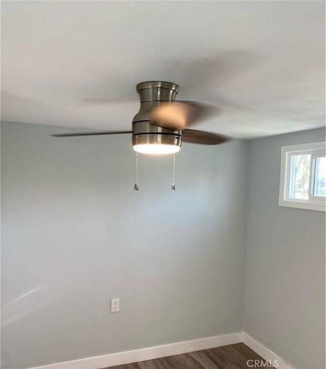 1220 W 7th St, San Bernardino, CA 92411 - spare room featuring dark wood-type flooring and a ceiling fan