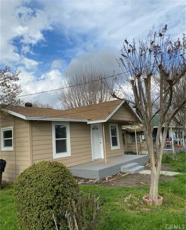 1220 W 7th St, San Bernardino, CA 92411 - bungalow with a porch and a front lawn