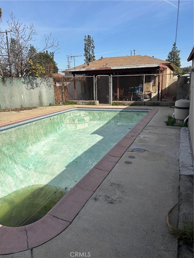 4203 Deland Ave, Pico Rivera, CA 90660 - view of swimming pool with a fenced backyard and a patio