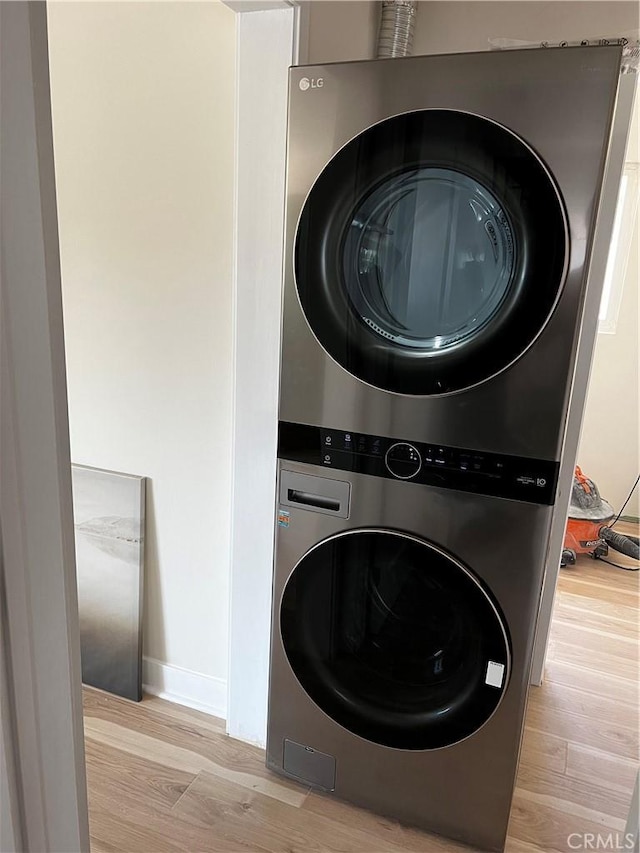 5126 Colfax Ave, Valley Village, CA 91601 - laundry room featuring estacked washer and dryer and light wood-style flooring