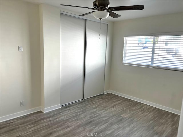 5126 Colfax Ave, Valley Village, CA 91601 - unfurnished bedroom featuring a closet, wood finished floors, and ceiling fan