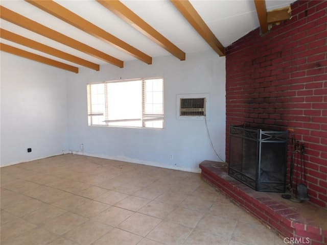 14200 Pawnee Rd, Apple Valley, CA 92307 - unfurnished living room with a wall mounted AC, light tile patterned flooring, and a brick fireplace