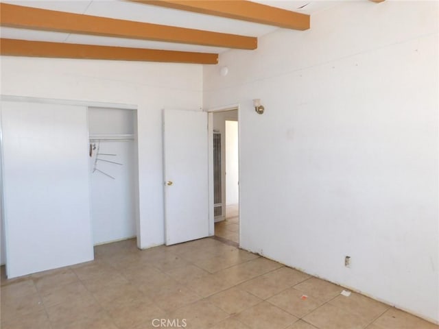 14200 Pawnee Rd, Apple Valley, CA 92307 - unfurnished bedroom featuring a closet and light tile patterned floors