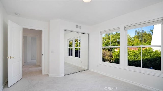 16 Bayleaf Ln, Irvine, CA 92620 - unfurnished bedroom featuring light colored carpet and a closet