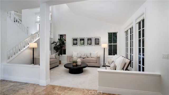 16 Bayleaf Ln, Irvine, CA 92620 - living room with lofted ceiling, stairway, and stone finish flooring